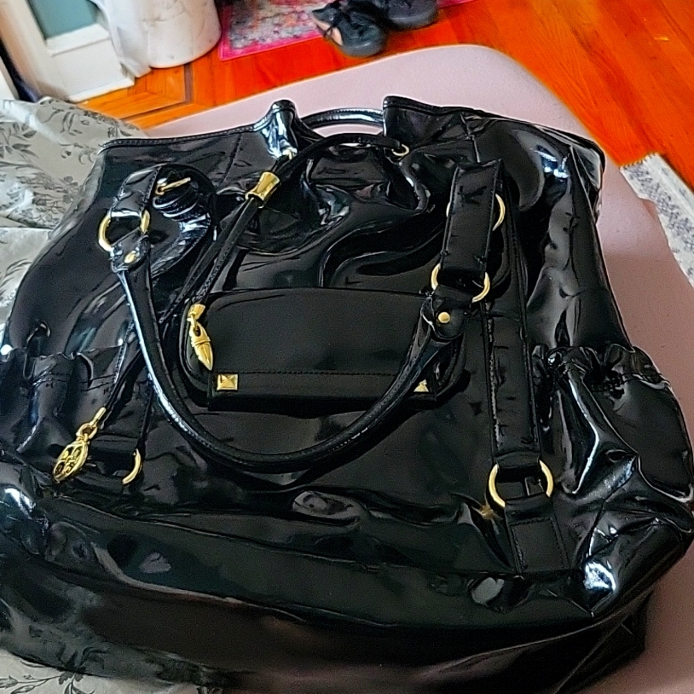 This is a Iman bag it has a few white marks on  it